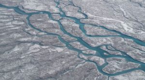 Decipher the mystery of the expanding "dark zone" of ice in Greenland